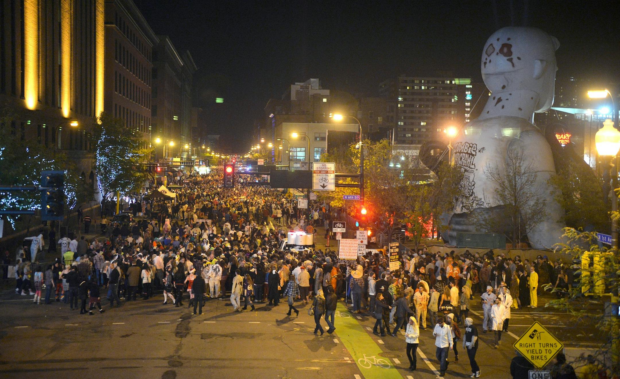 Minneapolis Zombie Pub Crawl broke the Guinness Book of World Records for largest gathering of people dressed as zombies with 15,458 zombies at 9:30 pm in downtown Minneapolis.