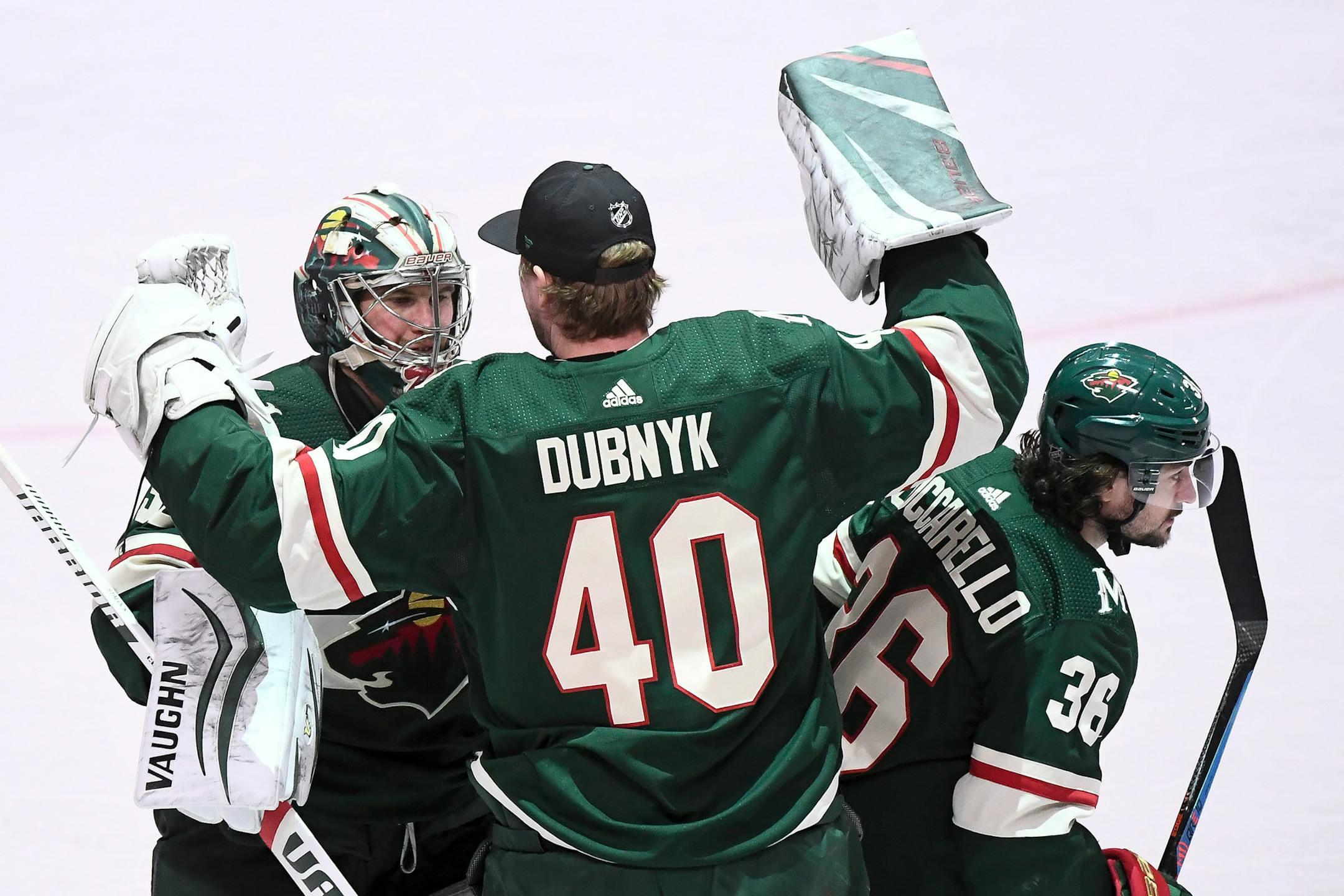 Wild goaltender Devan Dubnyk celebrated with Alex Stalock after Stalock shut out the Dallas Stars 7-0 on Jan. 18