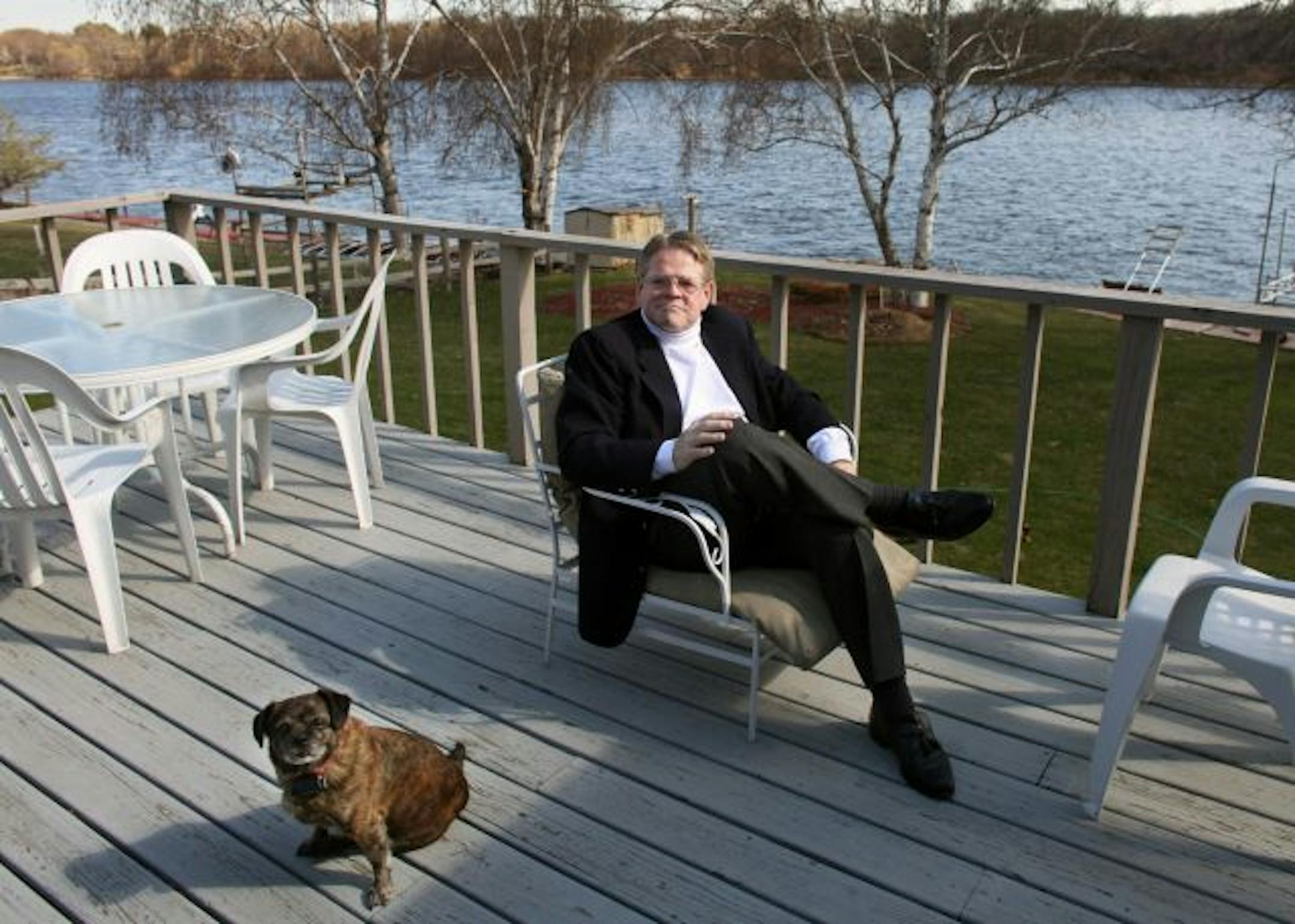 Richard Townsend-Anderson is the leader of a group of river home owners trying to stop a bill that would change rules on how river home owners can use their land and how cities regulate river development. His home is on the Mississippi river. That is his dog Pepe.