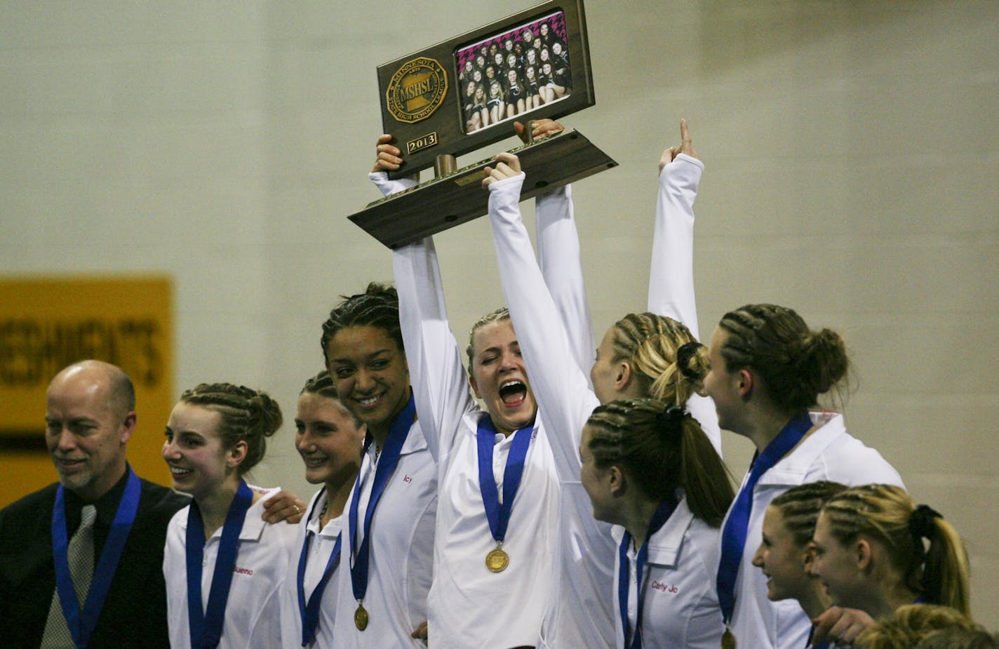 Roseville celebrates its state 2A team championship.