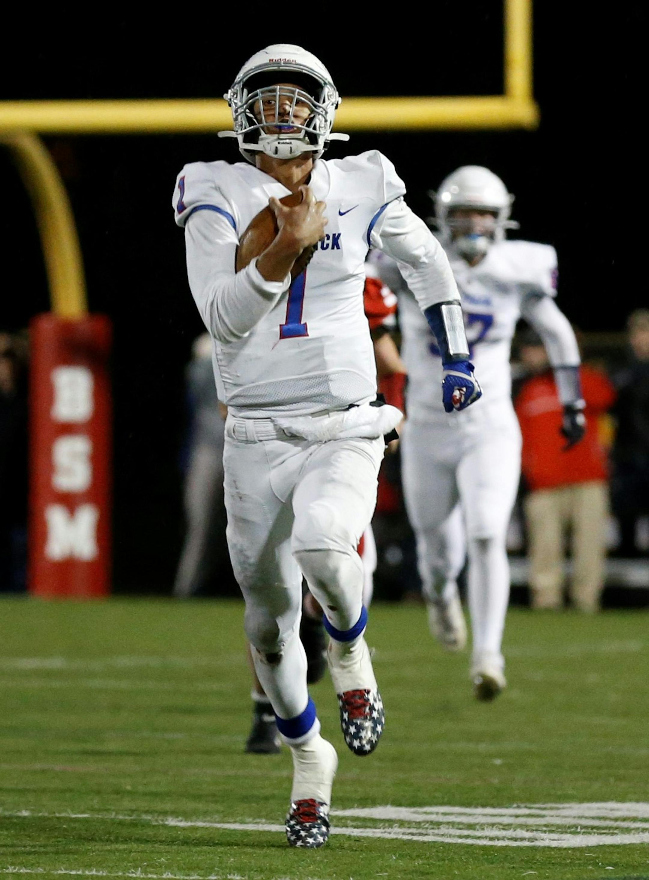 SMB quarterback Jalen Suggs (1) puts the Wolfpack in scoring position on a long gain with less than a minute to play against Benilde St. Margarets. The Wolfpack defeated the Red Knights 36-30 Friday night at Benilde High School. Photo by Jeff Lawler, SportsEngine