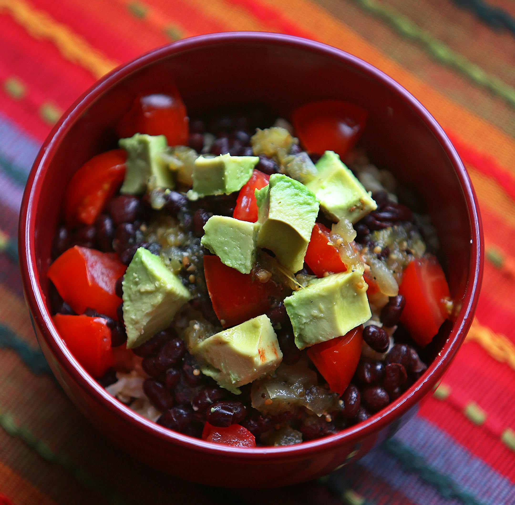 SCOTT KEELER | Times Vegan Rice bowl with brown rice, black beans, avocado, tomatoes and tomatillo salsa. FOR TASTE SECTION. ORG XMIT: 379611