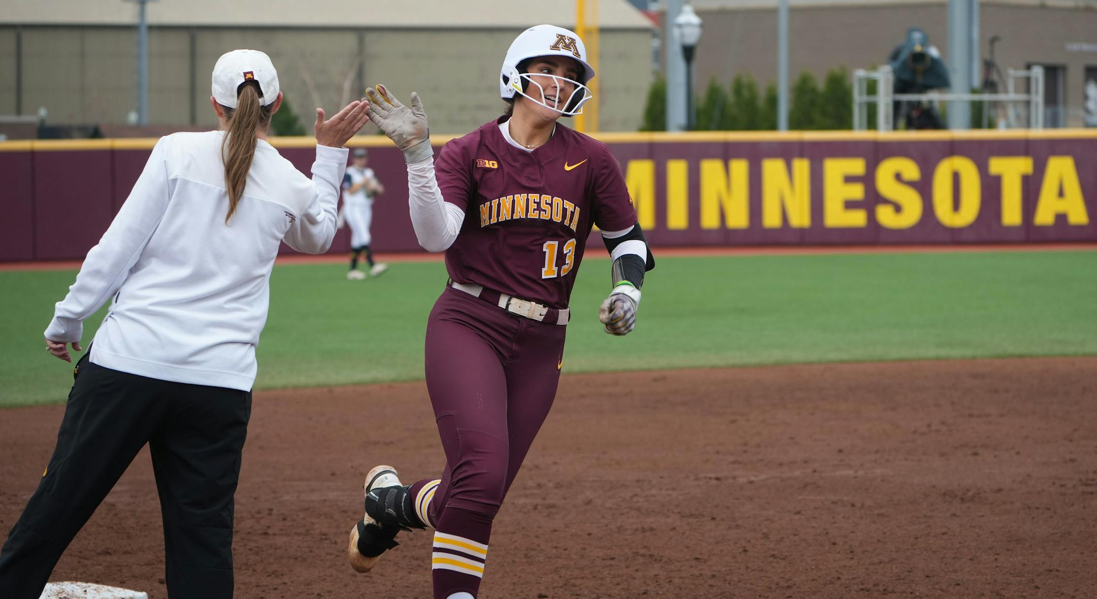 Minnesota catcher Taylor Krapf (13) rounds third after hitting her second homerun against Michigan in the second inning at Jane Sage Cowles Stadium in Minneapolis, Minn., on Saturday, May 6, 2023. The Gophers played the Michigan Wolverines in a regular season softball game at Jane Sage Cowles Stadium on the campus of the University of Minnesota. ] SHARI L. GROSS • shari.gross@startribune.com
