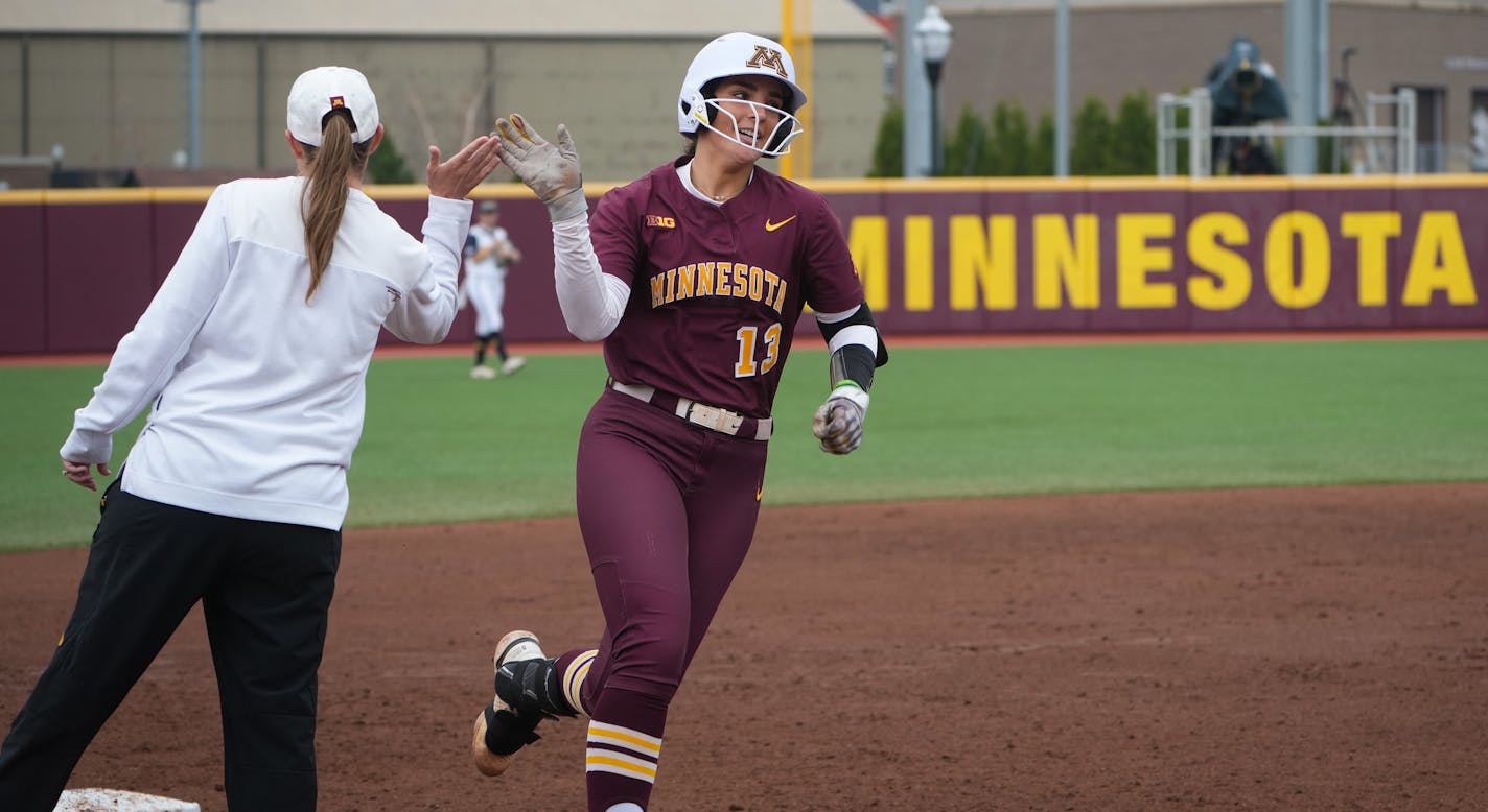 Minnesota catcher Taylor Krapf (13) rounds third after hitting her second homerun against Michigan in the second inning at Jane Sage Cowles Stadium in Minneapolis, Minn., on Saturday, May 6, 2023. The Gophers played the Michigan Wolverines in a regular season softball game at Jane Sage Cowles Stadium on the campus of the University of Minnesota. ] SHARI L. GROSS • shari.gross@startribune.com