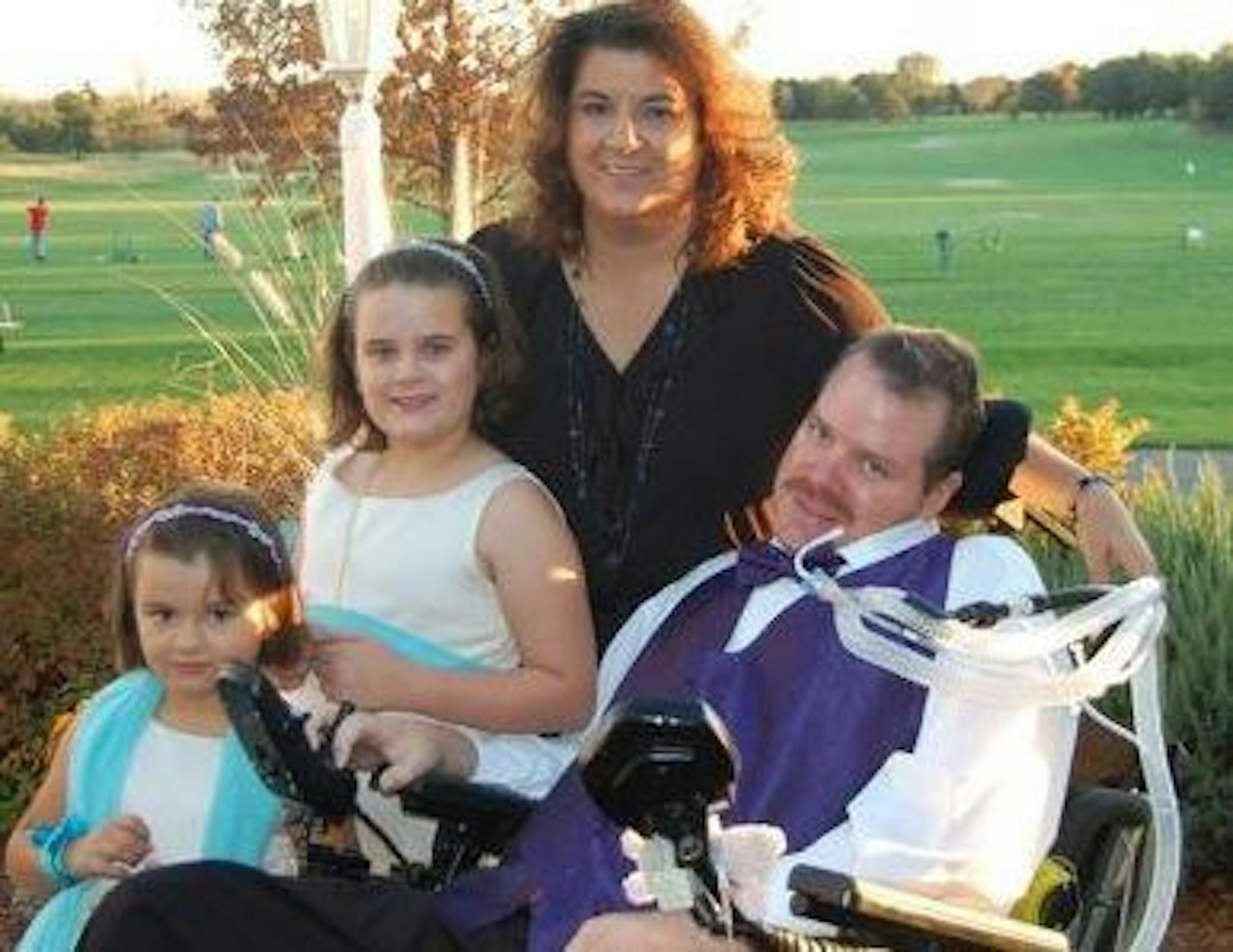 Douglas Palm photographed about seven years ago, with wife Debbie and children Molly, left, and Emma.