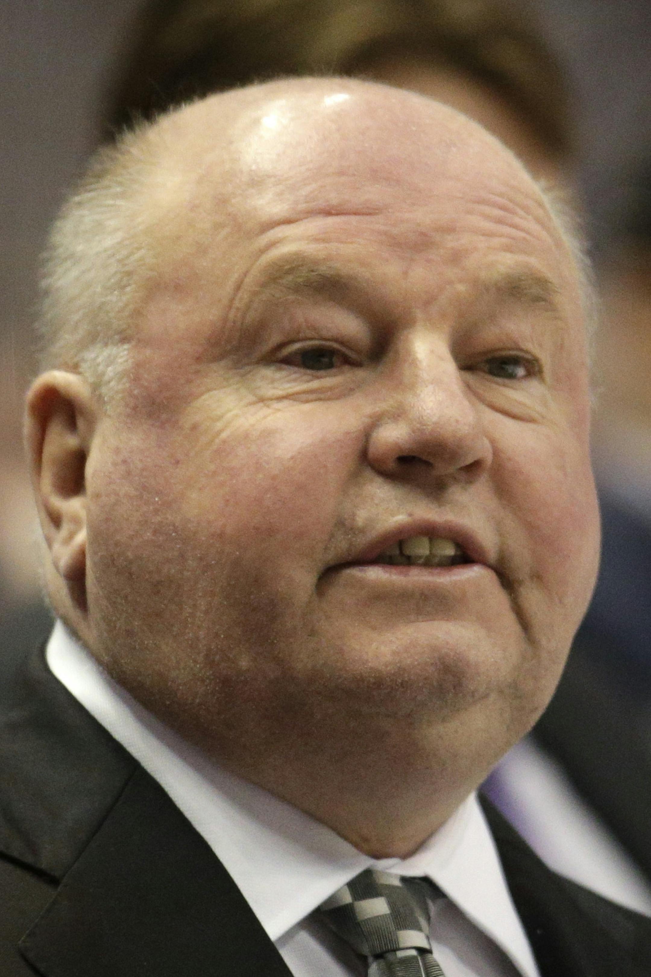 FILE - In this April 8, 2015 file photo, Anaheim Ducks head coach Bruce Boudreau coaches his team during the first period of an NHL hockey game against the Dallas Stars, in Anaheim, Calif. The Anaheim Ducks have fired coach Bruce Boudreau after their first-round exit from the playoffs. Ducks general manager Bob Murray announced the decision Friday, April 29, 2016. (AP Photo/Jae C. Hong, File)