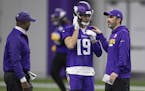 Vikings offensive coordinator Kevin Stefanski gave instructions to Adam Thielen during practice last month.
