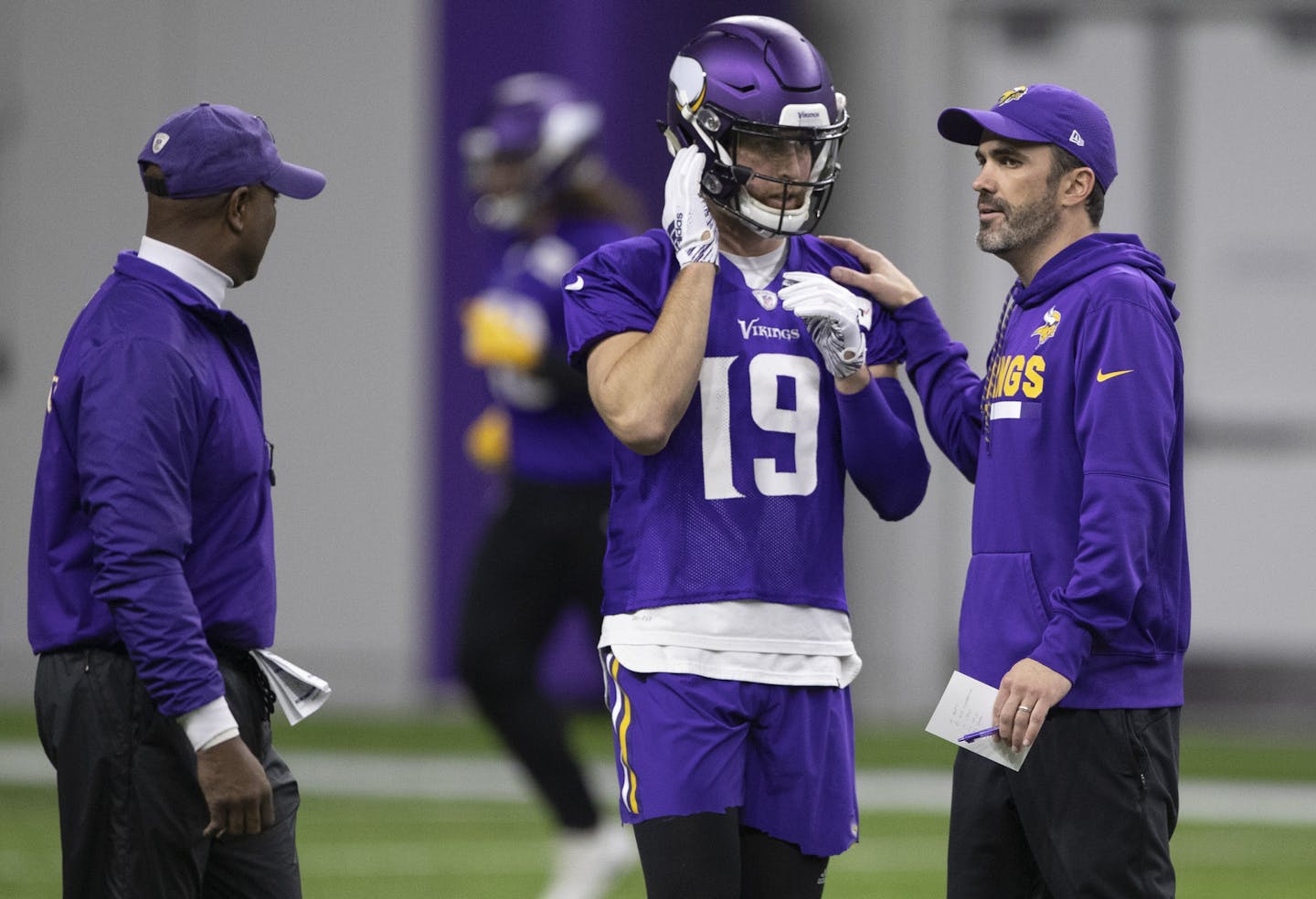 Vikings offensive coordinator Kevin Stefanski gave instructions to Adam Thielen during practice last month.