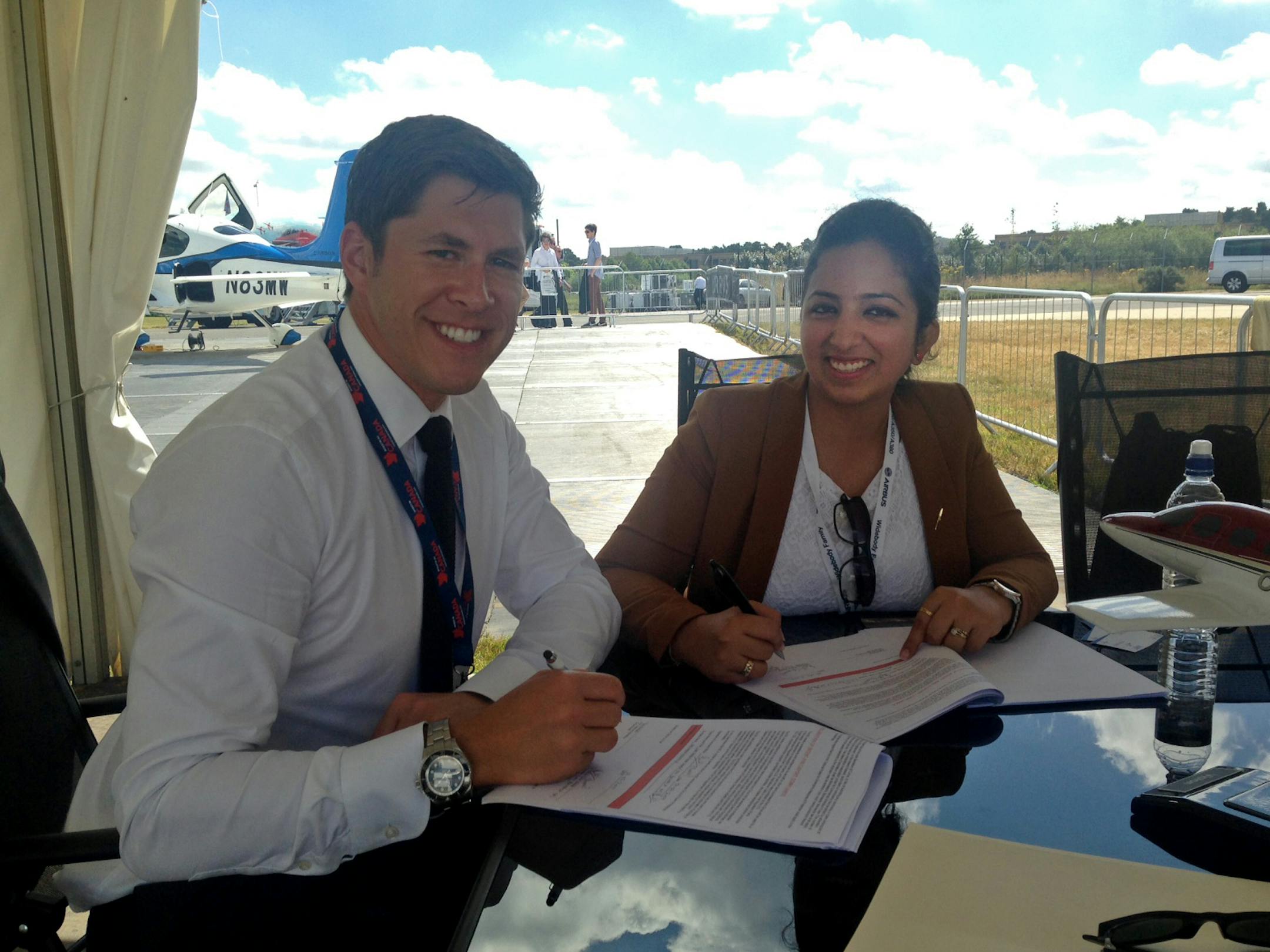 The image is of Adam Hahn, Director of Sales and Roohi Bahli, Sales Manager ‚Äì Cirrus India.