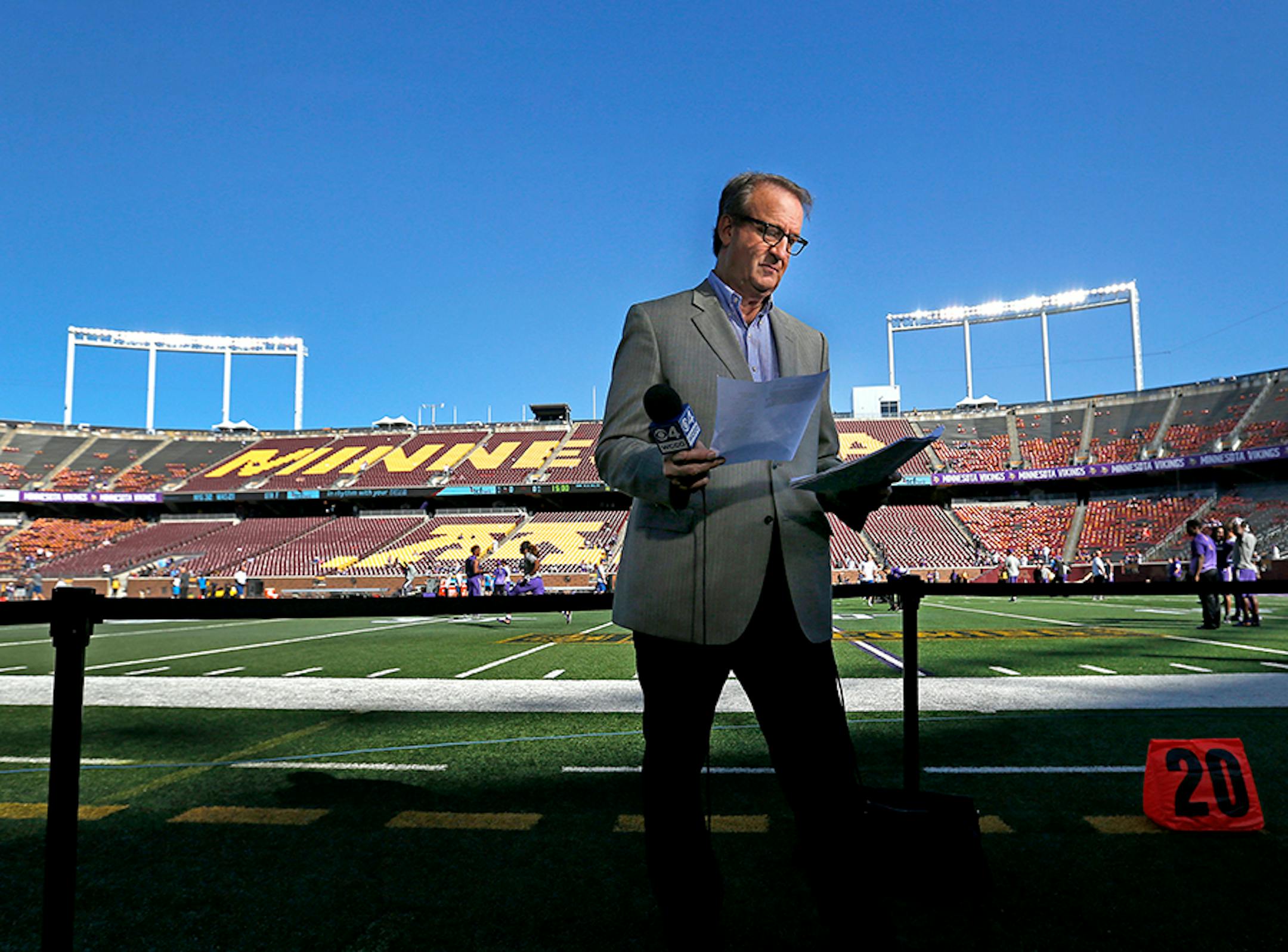 WCCO sports director Mark Rosen prepared for a pregame broadcast from the sidelines of TCF Bank Stadium before the Vikings vs. Lions game.