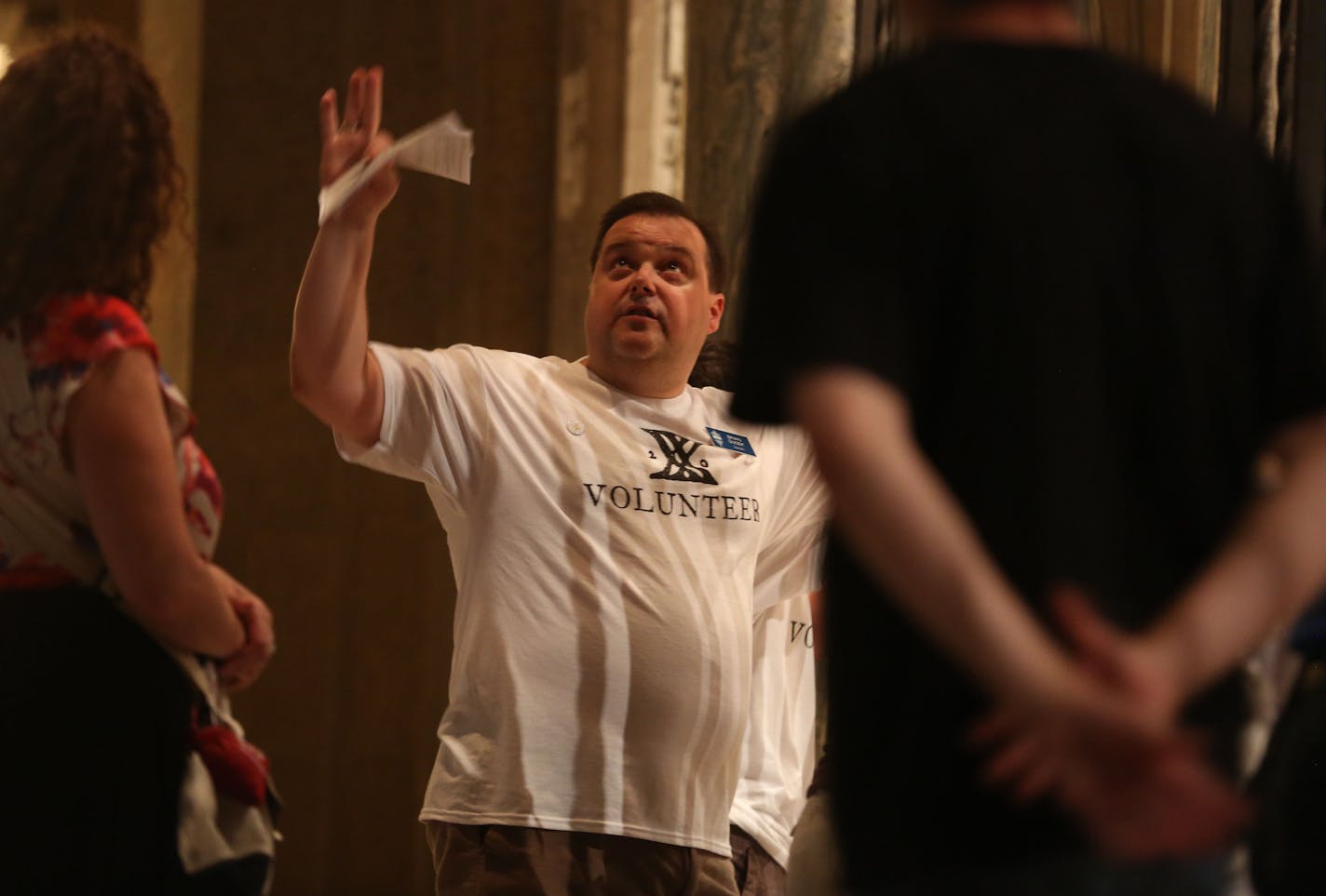 Brian Dusek, docent, lead one of the church tours. ] (KYNDELL HARKNESS/STAR TRIBUNE) kyndell.harkness@startribune.com During the Basilica Block Party in Minneapolis, Min. Friday, July 11, 2014.