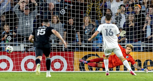 Sacha Kljestan (16) of the L.A. Galaxy shoots the ball past Minnesota United goalkeeper Dayne St. Clair (97) for a penalty kick goal in the second hal