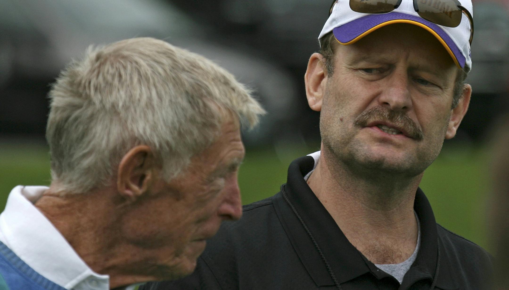 BRUCE BISPING • bbisping@startribune.com
Eden Prairie, MN., Friday, 6/1/2007. (left to right) Former Vikings Coach Jerry Burns talked with current coach Brad Childress during a visit to Vikings practice at Winter Park.