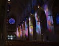 Morning light through the stained glass windows casts a colorful display on the walls of the National Cathedral in Washington D.C. John Piepkorn