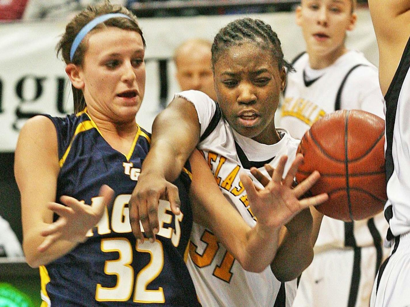 Totino-Grace's Sasha McHale (32) in the Class 3A title game of the 2008 girls' basketball tournament. McHale, 23, died on Saturday.