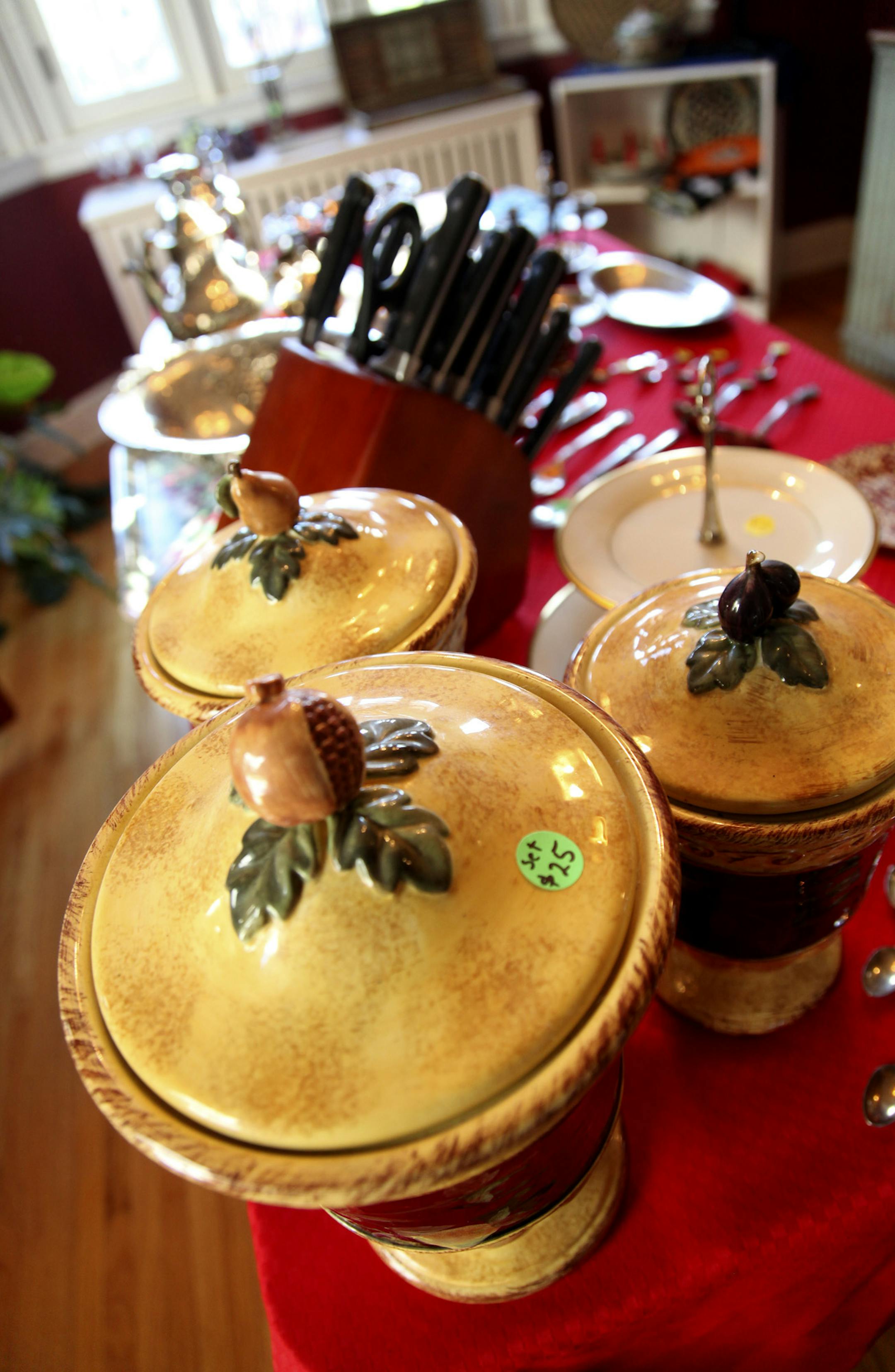 ELIZABETH FLORES • eflores@startribune.com October 5, 2010 - Minneapolis, MN - Dr. Sheryl Grassie gathered items from her home to sale during her estate sale. Grassie is a number of individuals who are downsizing.