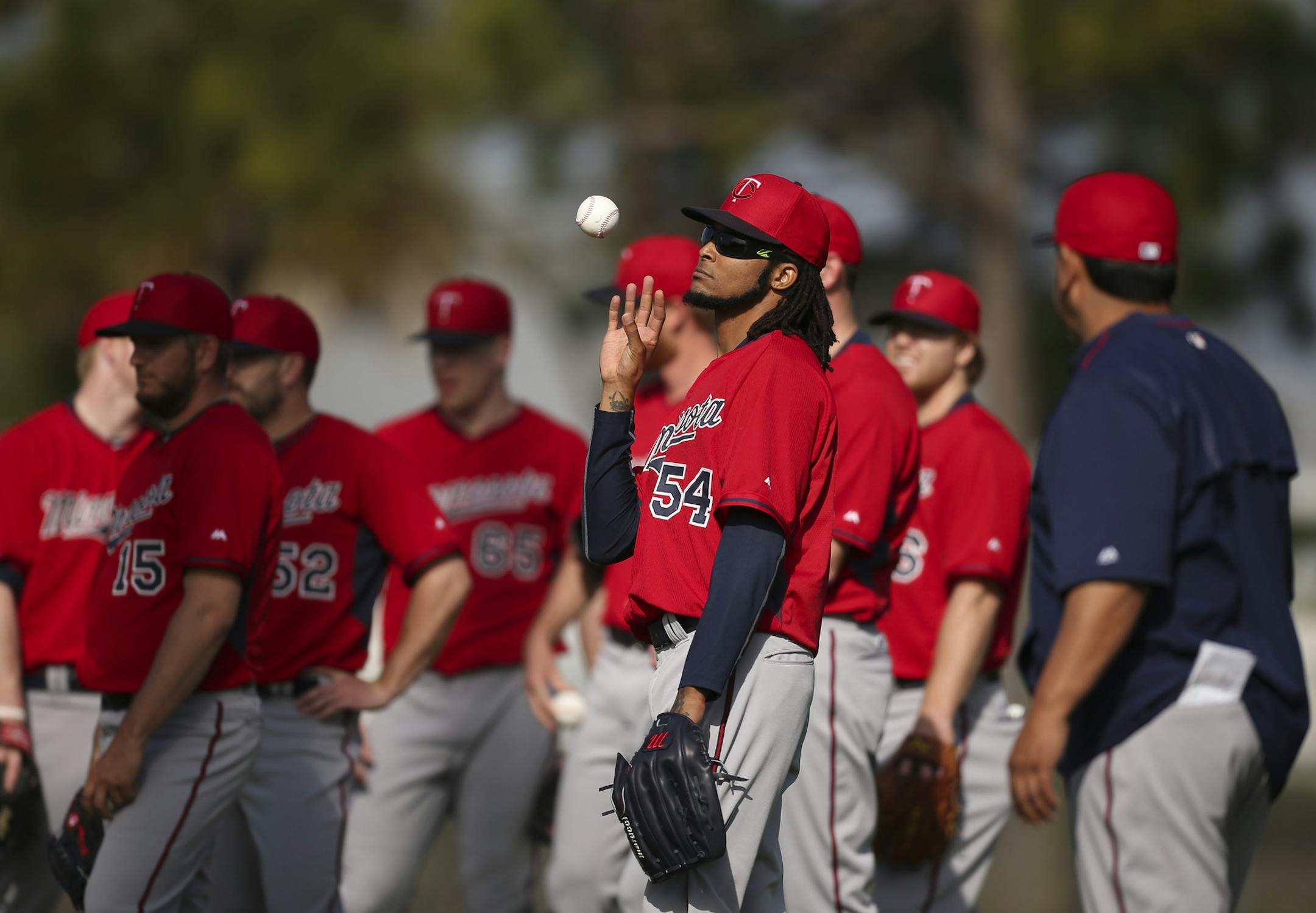 The Twins' Ervin Santana stood with some other pitchers before beginning a drill Tuesday morning at Hammond Stadium. ] JEFF WHEELER ï jeff.wheeler@startribune.com Twins pitchers and catchers continued their workouts Tuesday morning, February 24, 2015 at Hammond Stadium in Fort Myers, FL.