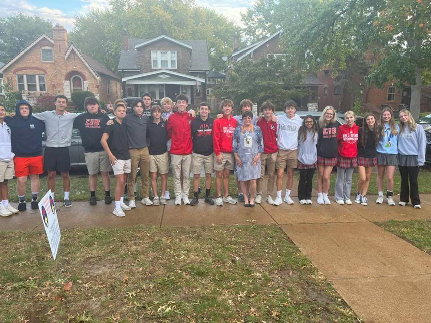 Peggy Winckowski, center, with many of the regular attendees of her weekly Wednesday Breakfast Club. Every Wednesday, Winckowski cooks breakfast for about 30 of her late grandson's friends. MUST CREDIT: Courtesy of Peggy Winckowski