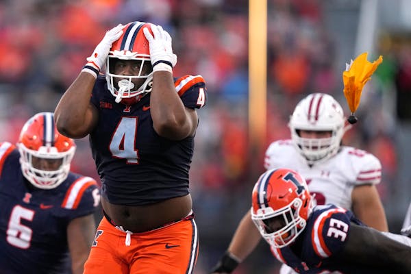 Illinois defensive lineman Jer’Zhan Newton was flagged for targeting and ejected after a hit against Wisconsin quarterback Braedyn Locke on Oct. 21.