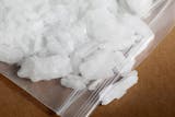 Pure methamphetamine in rock from, known as ice, is photographed at the DEA's North Central Laboratory in Chicago, Ill.