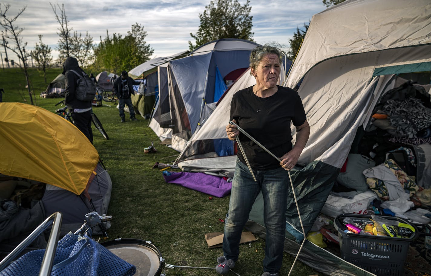 Jessica Howard, who has stayed at Camp Quarantine one month so far tries to make her home as comfortable as possible.] What began in March as a small camp consisting of about a couple dozen homeless adults has now swelled to more than 100 residents in tents. Known as "Camp Quarantine," the fast-growing encampment has raised alarms over the health of the camp residents amid the coronavirus pandemic.RICHARD TSONG-TAATARII &#xa5; richard.tsong-taatarii@startribune.com