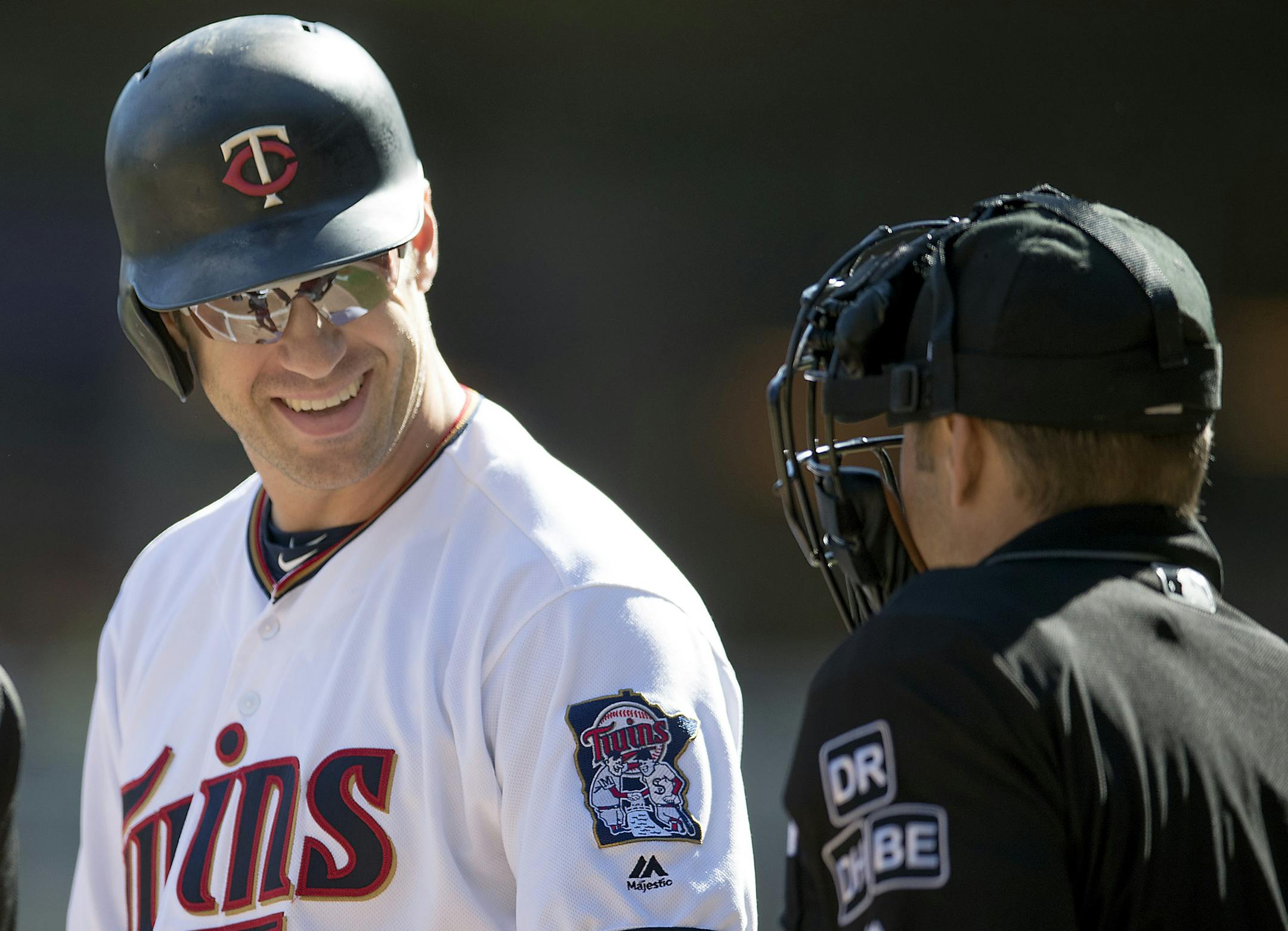 Twins first baseman Joe Mauer exchanged a smile with the umpire as he made his way to home plate to bat in the first inning as the Twins took on the Chicago White Sox in the first game of a doubleheader, Friday, September 28, 2018 in Minneapolis, MN. ] ELIZABETH FLORES ï liz.flores@startribune.com