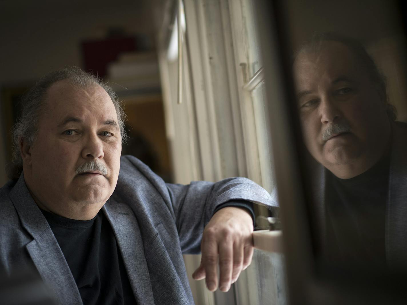 Bob Schwiderski is pictured in his home on Friday, Jan. 16, 2015 in Wayzata. ] (Aaron Lavinsky | StarTribune) Bob Schwiderski was sexually abused by a priest during his childhood and hopes to help others who have gone through similar situations through his advocacy. He organizes support groups for survivors of clergy abuse and has followed the archdiocese for decades. Schwiderski was photographed in his home on Friday, Jan. 16, 2015 in Wayzata.