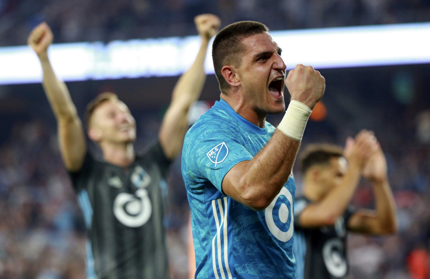 Minnesota United's Vito Mannone, foreground, celebrates with his team after a win over FC Dallas in an MLS soccer match Saturday, July 13, 2019, in St. Paul, Minn. (Alex Kormann/Star Tribune via AP)