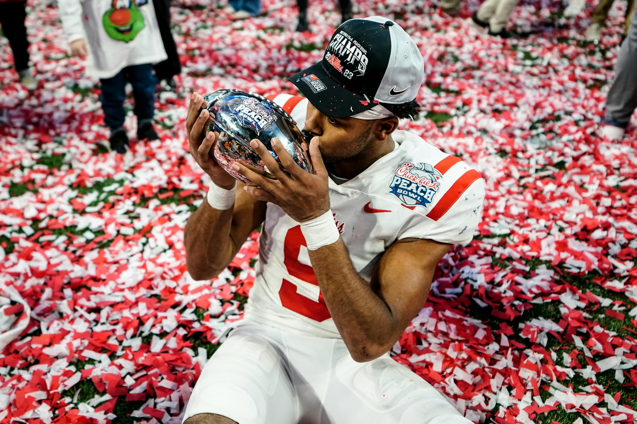 Ole Miss players celebrated on the field after winning the Peach Bowl over Penn State