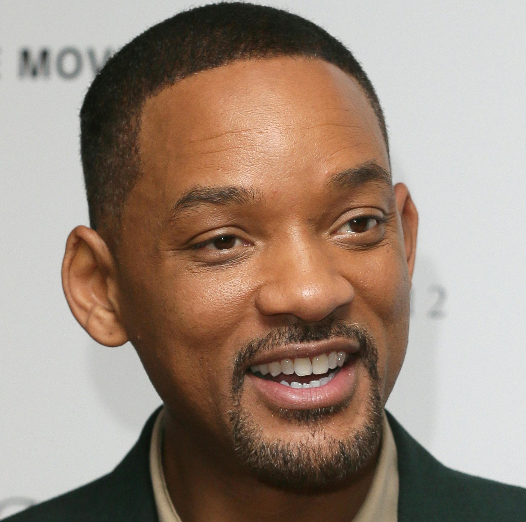 Actor Will Smith poses for photographers upon arrival for the screening of the film 'Concussion' in London, Thursday, Jan. 28, 2016. (Photo by Tim Ireland/Invision/AP)