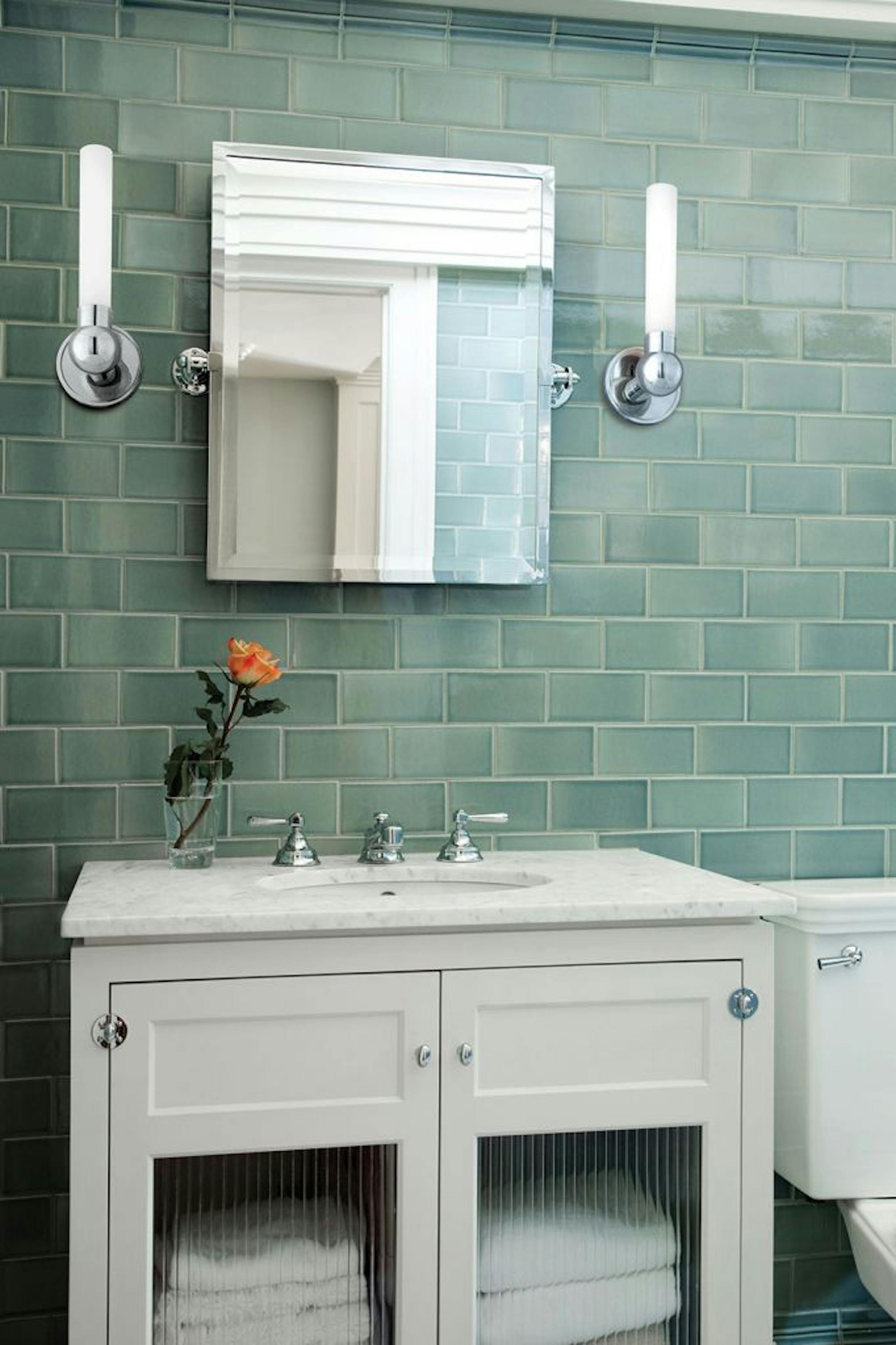 For small mirrors, decorative wall fixtures placed on each side of the mirror will provide the even, shadow-free facial illumination that is necessary for your daily grooming tasks in the bathroom.