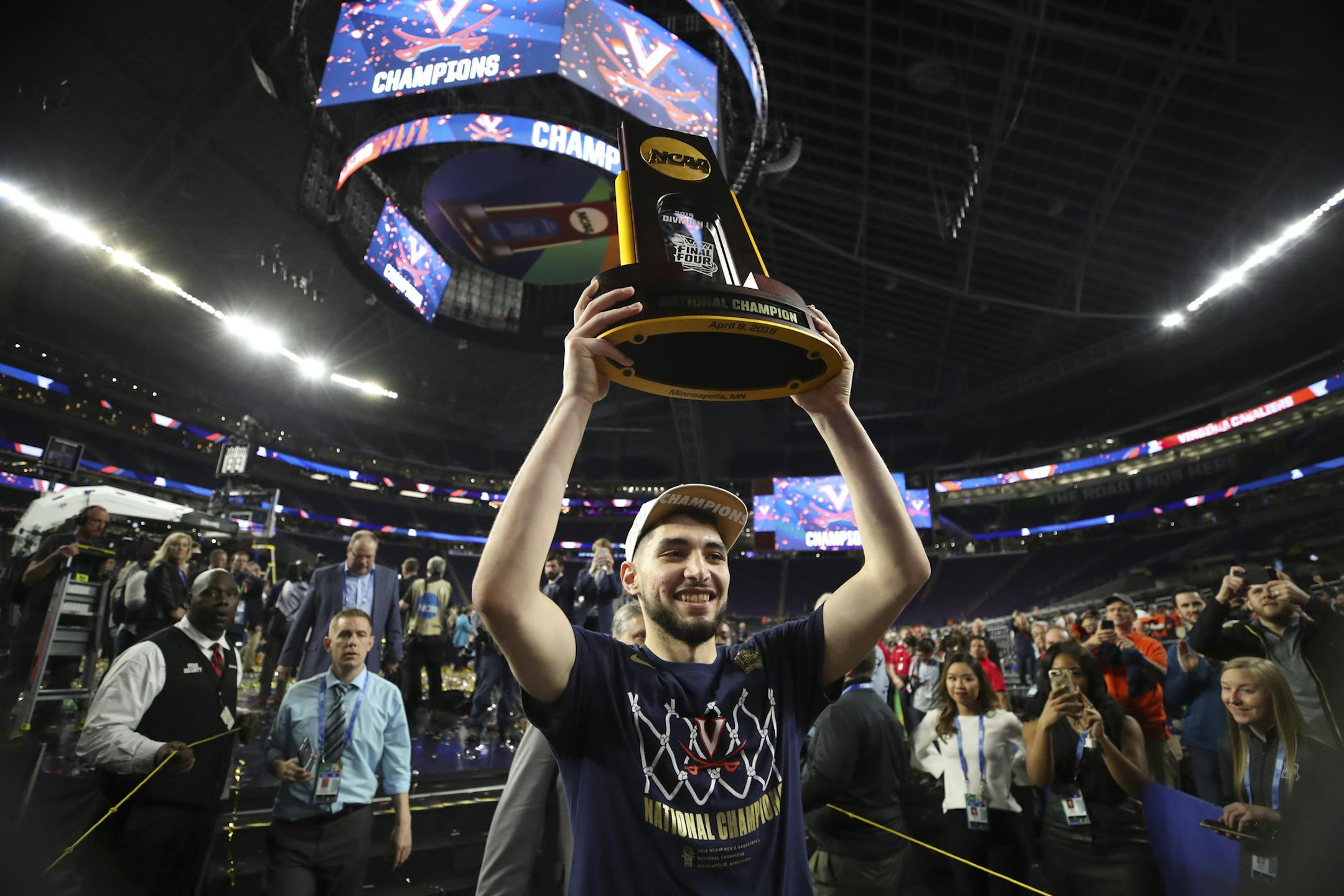 Virginia's Ty Jerome hoisted the championship trophy aloft Monday as he walked off the U.S. Bank Stadium court. The Cavaliers showed that not just the blue bloods can win titles, a trend that might continue.