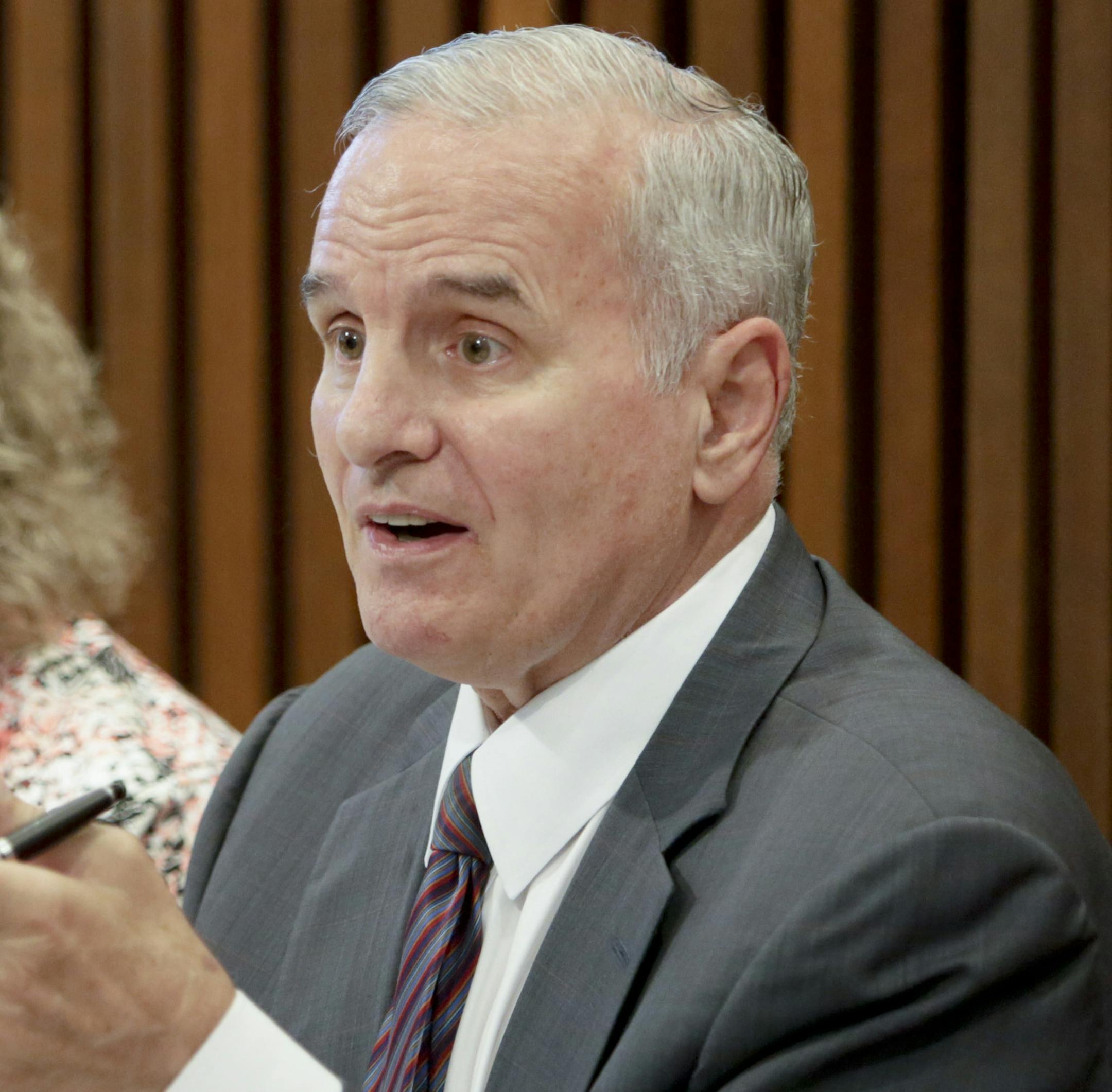 Minnesota Governor Mark Dayton, from right, meets with Moorhead Mayor Del Rae Williams, Council Member Heidi Durand, the City Council and other local leaders Wednesday, Sept. 3, 2014, in City Hall. Michael Vosburg / Forum Photo Editor