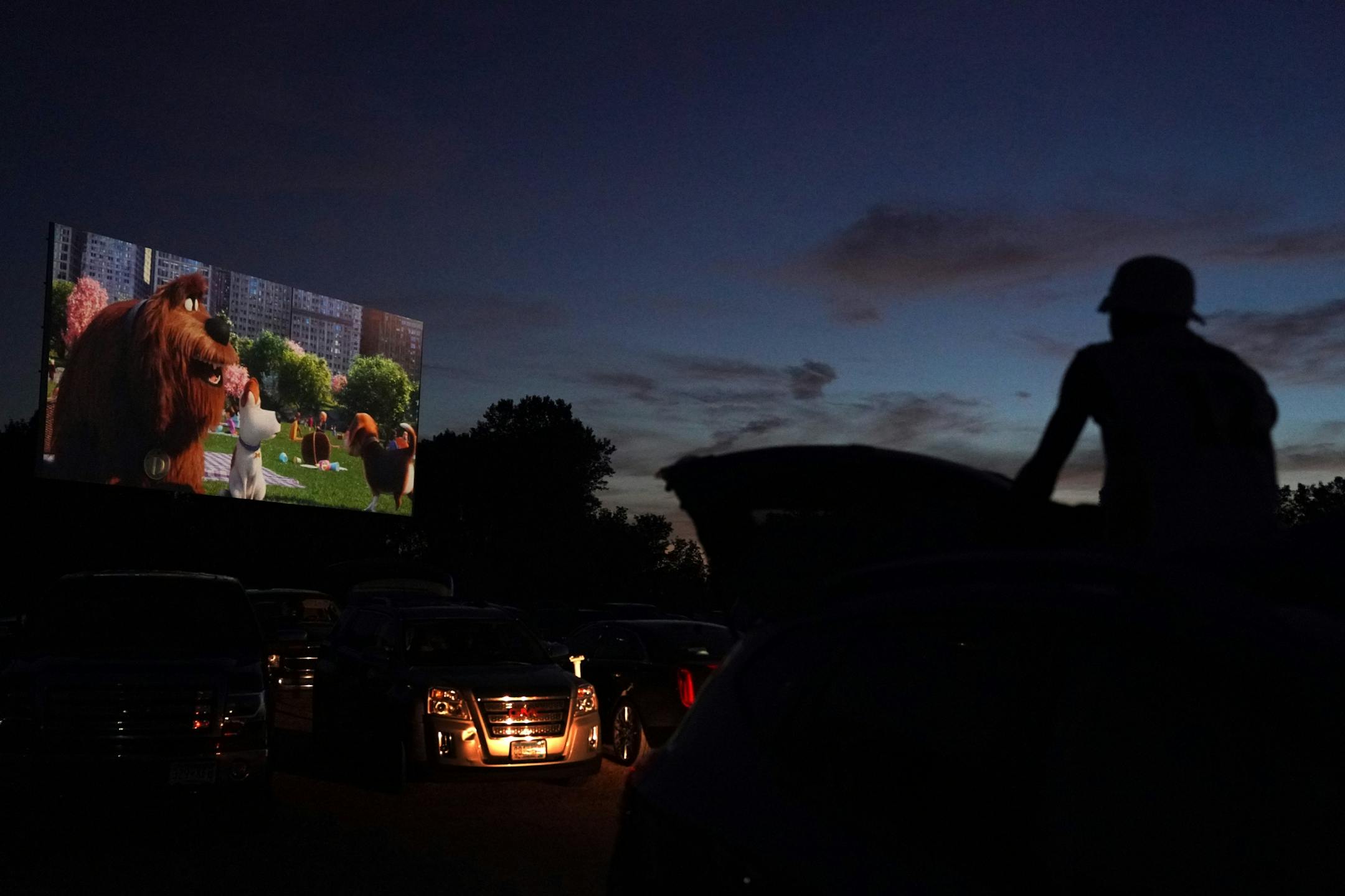 Bryant Howard, 18, watched from the roof of his car during the start of Friday night's show.