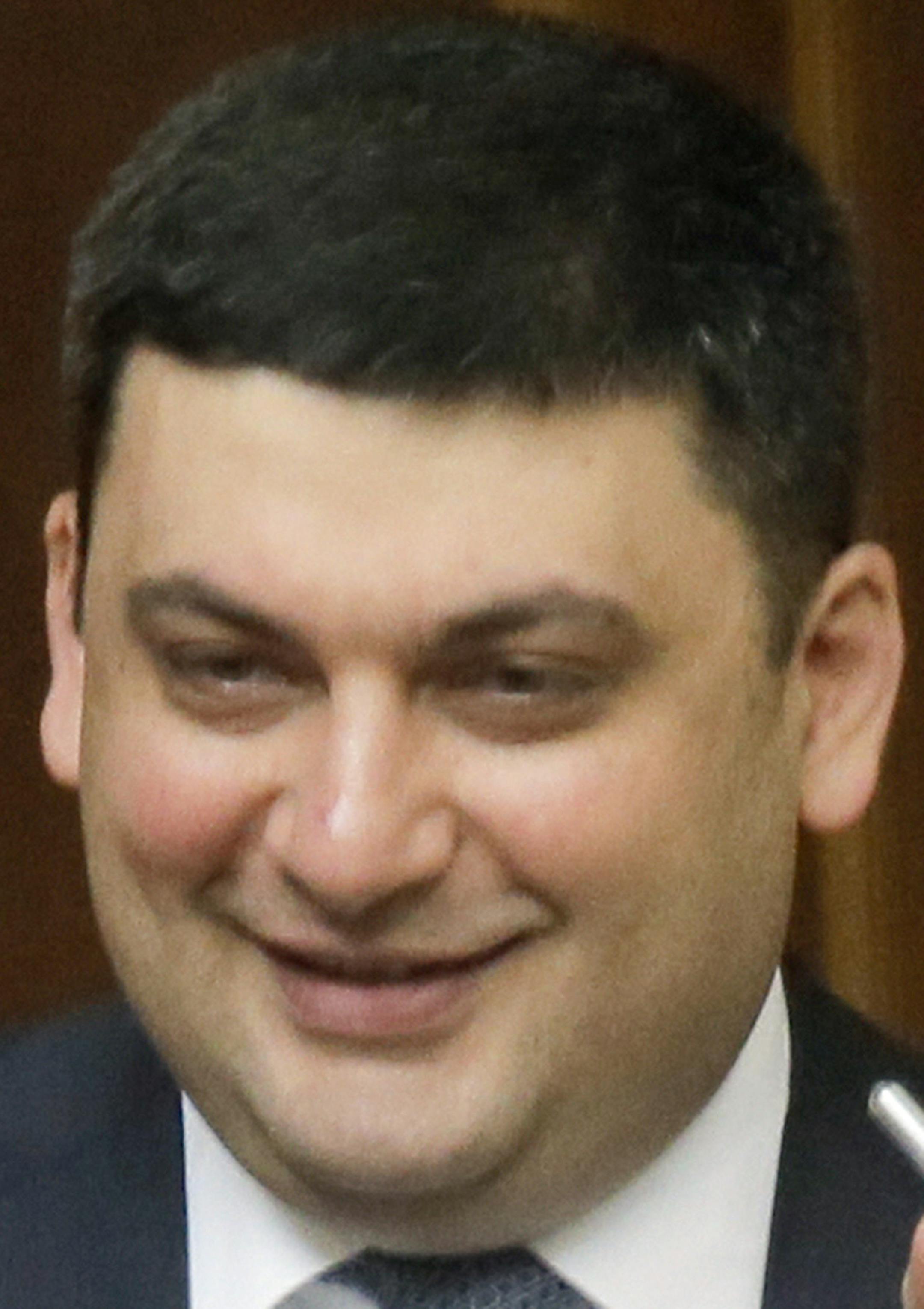 Ukraine's Prime Minister Vladimir Groysman smiles after he was appointed the Prime Minister during the Ukrainian parliament session in Kiev, Ukraine, Thursday, April 14, 2016. Ukraine’s parliament has endorsed Arseniy Yatsenyuk’s resignation and appointed Vladimir Groysman as the new prime minister. (AP Photo/Efrem Lukatsky)