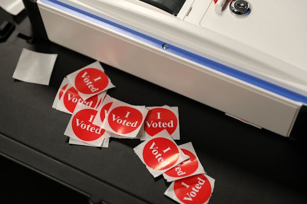Stickers awaited voters after they cast their ballots on primary election day at Holy Spirit Catholic Church in St. Paul.