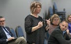 Chandra Kreyer, emergency management coordinator for Anoka-Hennepin Schools showed school principals at the district's headquarters new radios they wi