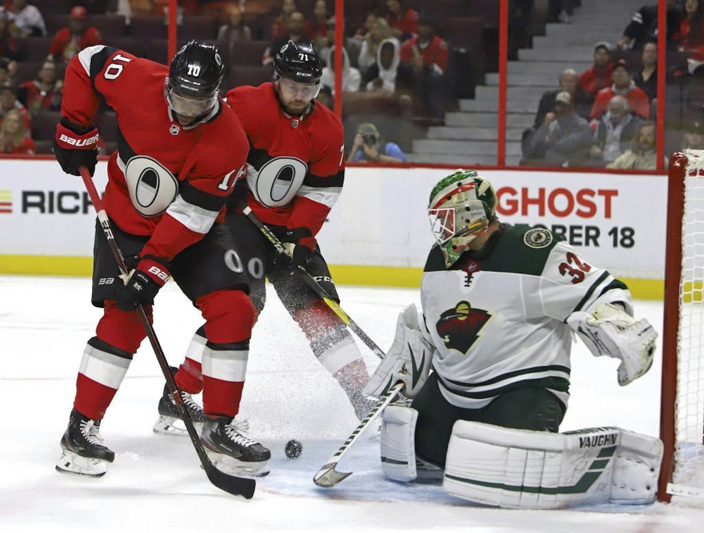 Wild goalie Alex Stalock was pressured by Ottawa's Anthony Duclair (10) and Chris Tierney on Monday.