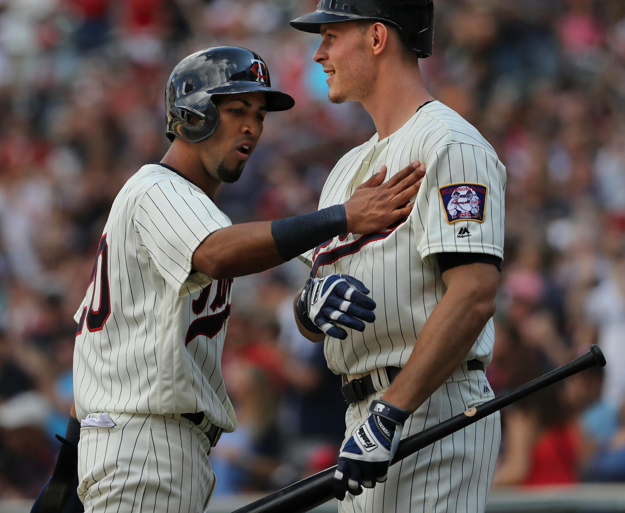 Eddie Rosario, left, greeted teammate Max Kepler after he scored in the eighth inning on a single by Joe Mauer. ] Twins vs Tigers at Target Field on 7/23/17.Richard Tsong-Taatarii/Richard Tsong-taatarii@startribune.com