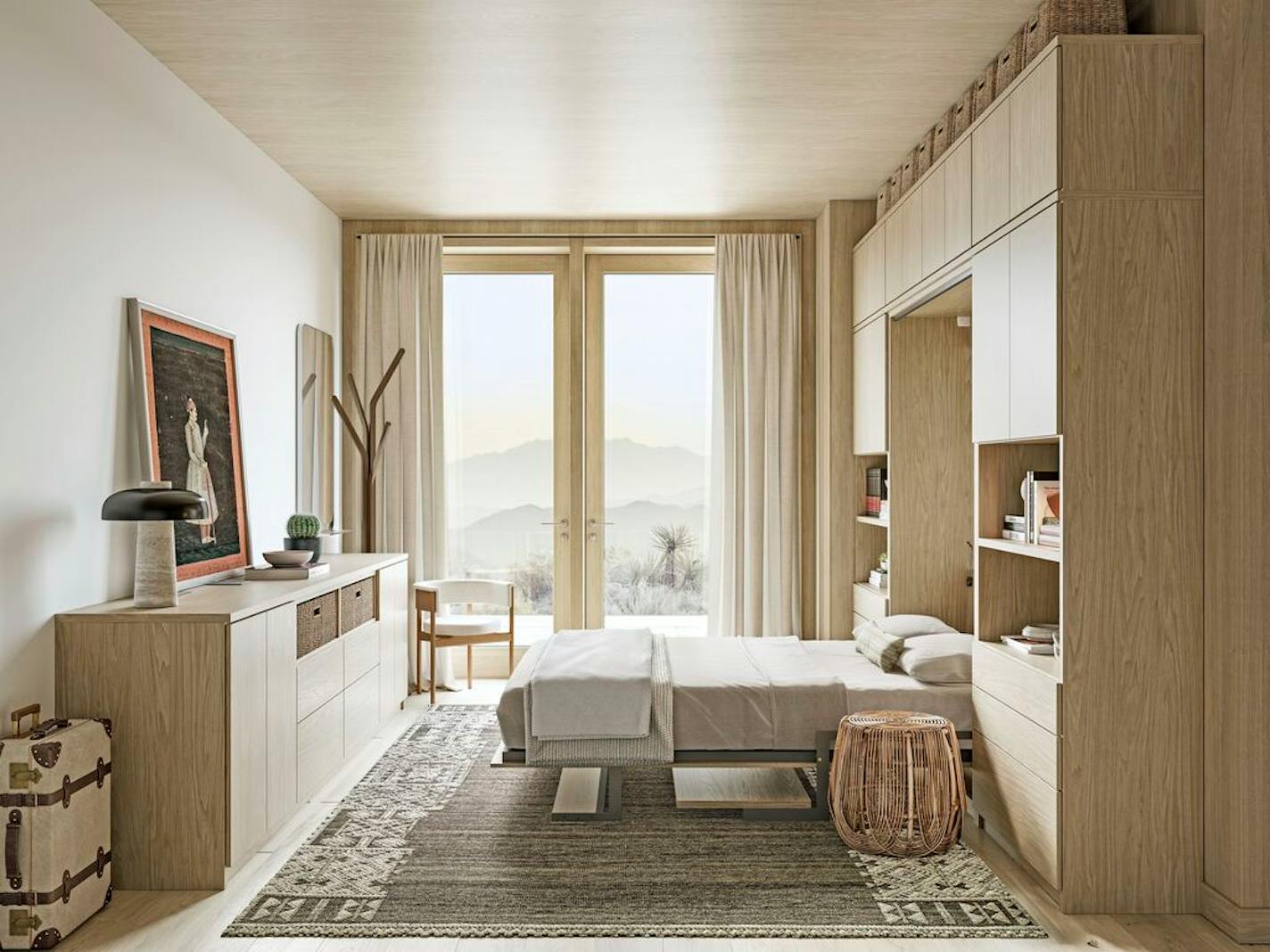 A Murphy bed in a light wood cabinet with a dresser in the same light wood across from it, and windows in the background.