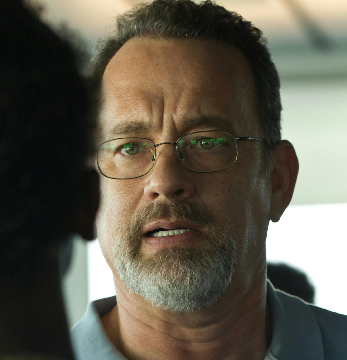 This film image released by Sony - Columbia Pictures shows Tom Hanks, center, in "Captain Phillips." (AP Photo/Sony - Columbia Pictures) ORG XMIT: MIN2013090410431927