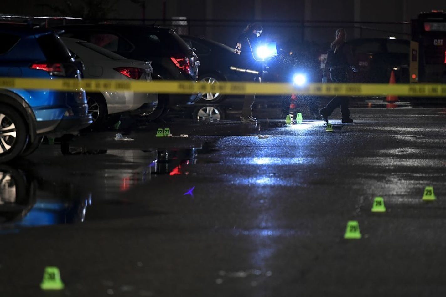 Investigators worked the scene of a homicide on Wednesday, Oct. 2, 2019 at the Cedars 94 apartment complex in Minneapolis, Minn.