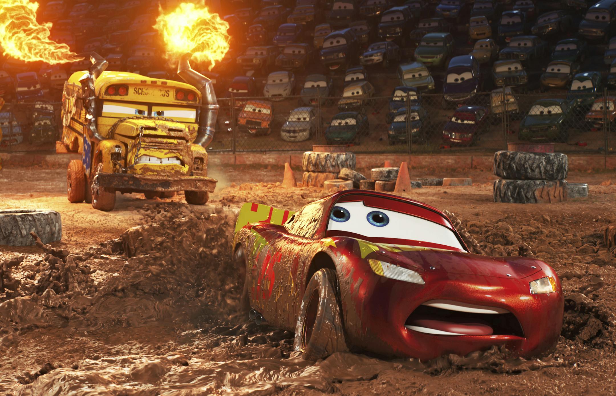 This image released by Disney shows Lightning McQueen, voiced by Owen Wilson, foreground, in a scene from "Cars 3." (Disney-Pixar via AP)