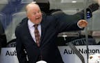 Minnesota Wild head coach Bruce Boudreau directs his players against the Colorado Avalanche in the second period of an NHL preseason hockey game Tuesd
