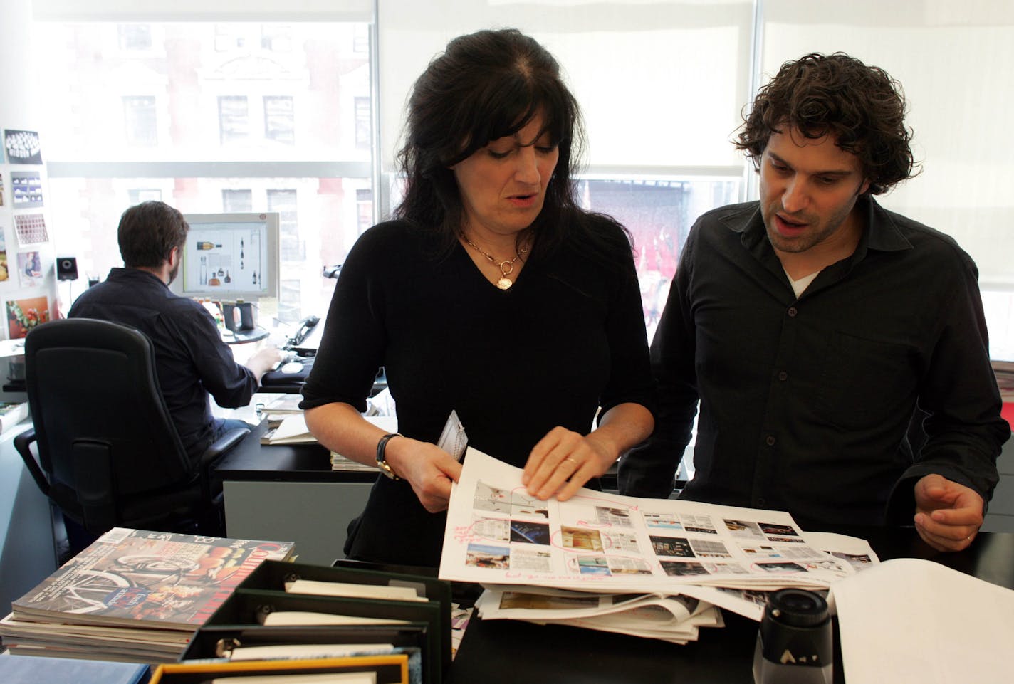 (NYT24) NEW YORK -- Oct. 3, 2004 -- GOURMET-COOKBOOK -- Ruth Reichl and Richard Ferretti of Gourmet magazine in the office in New York on Sept. 21, 2004. Houghton Mifflin is betting an unusual amount of money that "The Gourmet Cookbook" will enter the pantheon, along with "The Joy of Cooking," "How to Cook Everything" and "The Good Housekeeping Illustrated Cookbook." The publishing house is putting $1 million into promoting the book, by all accounts a pretty steep investment for a cookbook; the