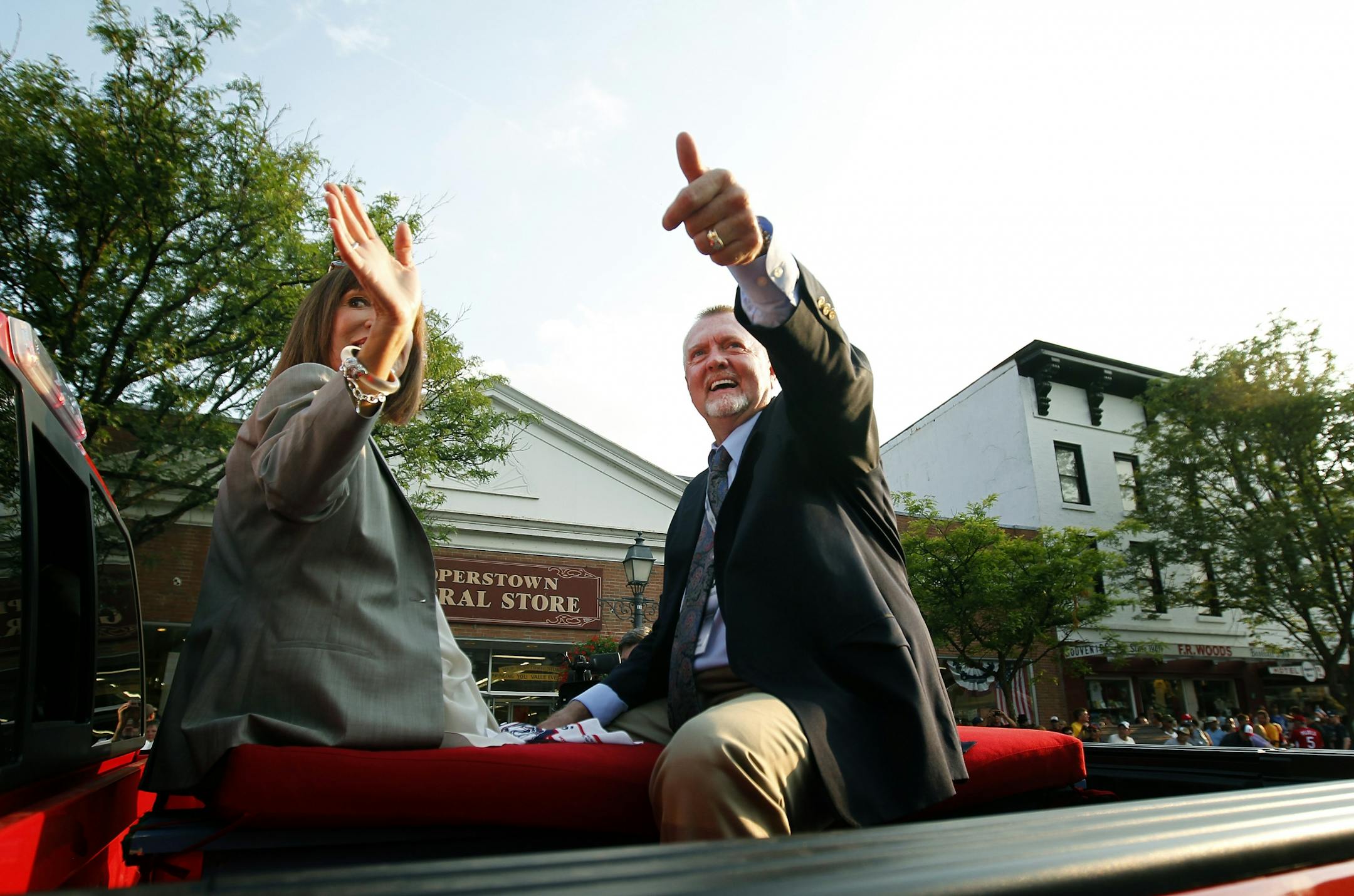 Bert Blyleven and his wife Gayle waved to fans during the Hall of Fame Legends Parade through downtown Cooperstown, NY on Saturday. Blyleven will be inducted into the National Baseball Hall of Fame on Sunday.