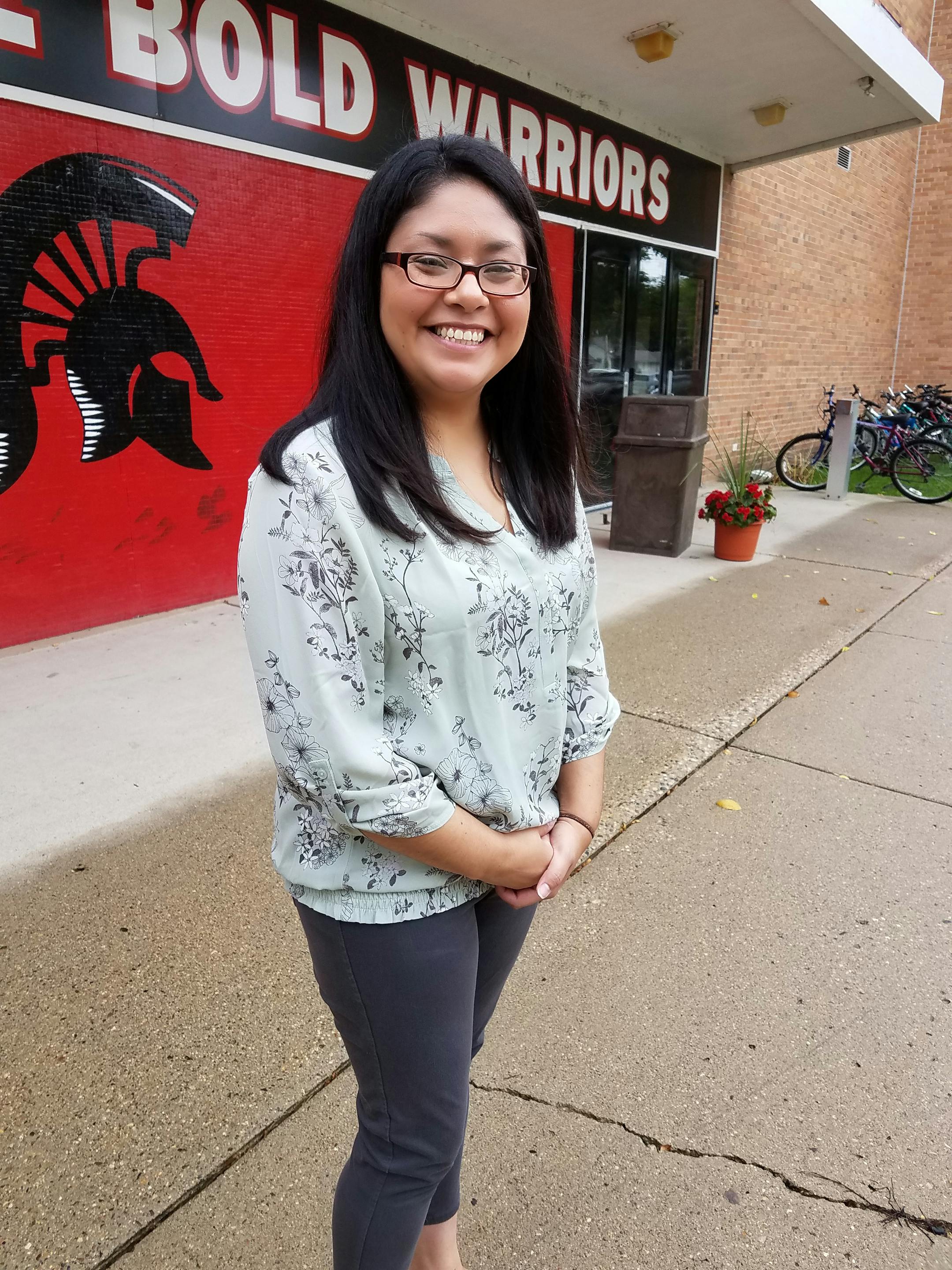 Olivia native Val Rodriguez is considering moving back. She works in Willmar and emphasizes the need for programs to support young people.