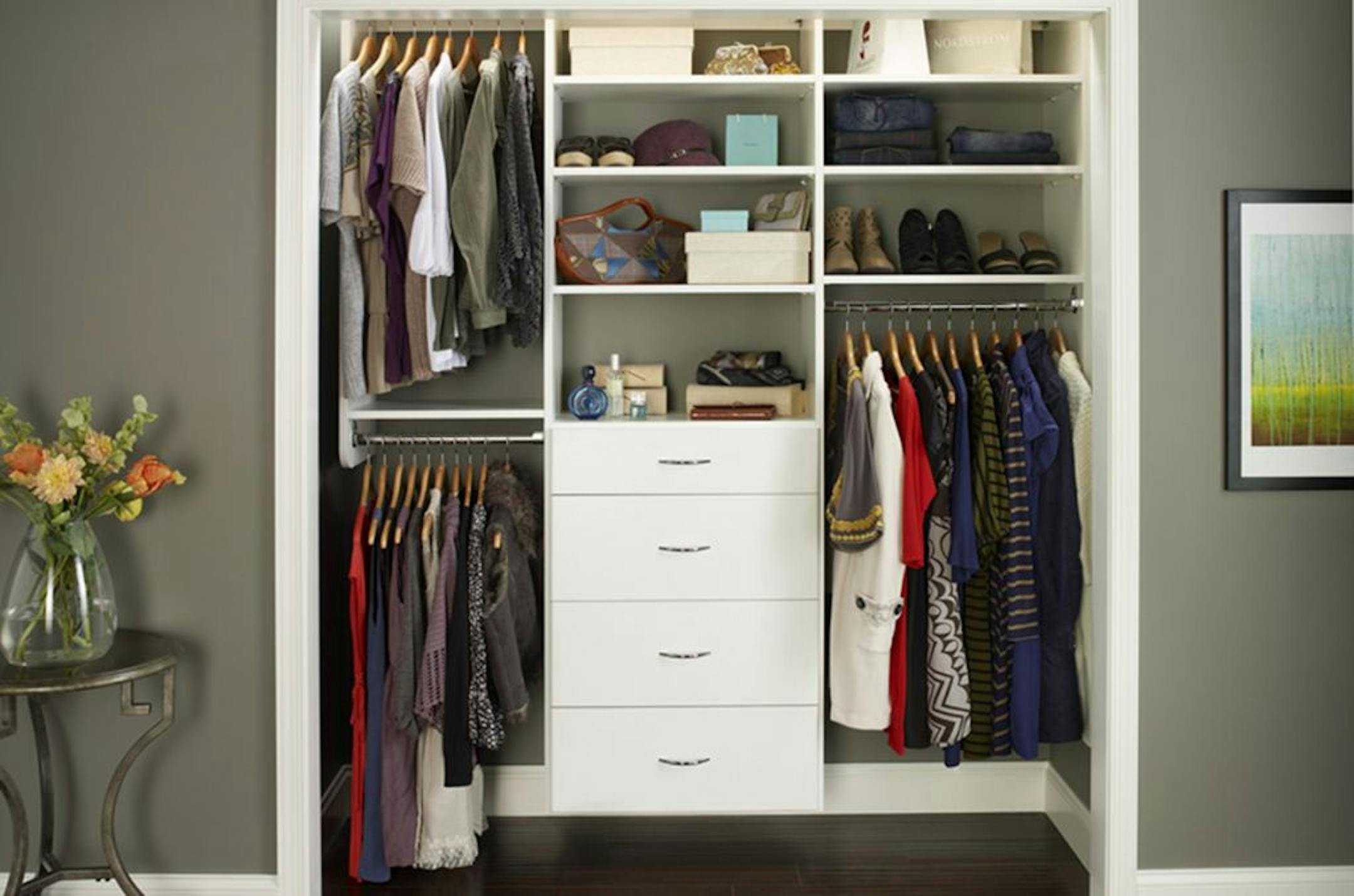 for steals0802The 72-inch closet in white laminate with soft edging, four soft close drawers, and chrome hang rods was $628 installed through Home Options in Robbinsdale.