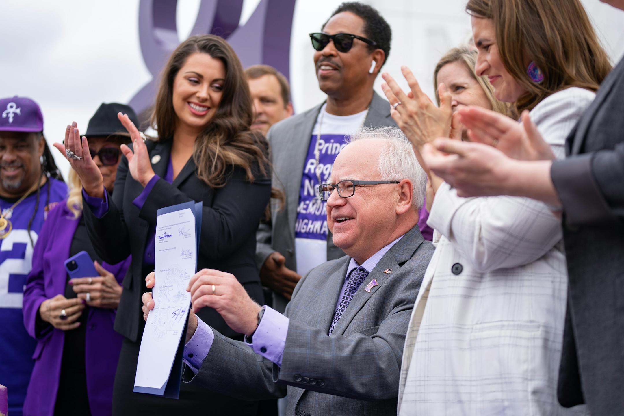 Minnesota Governor Tim Walz signs a bill renaming a 7-mile stretch of Highway 5 as "Prince Rogers Nelson Memorial Highway."