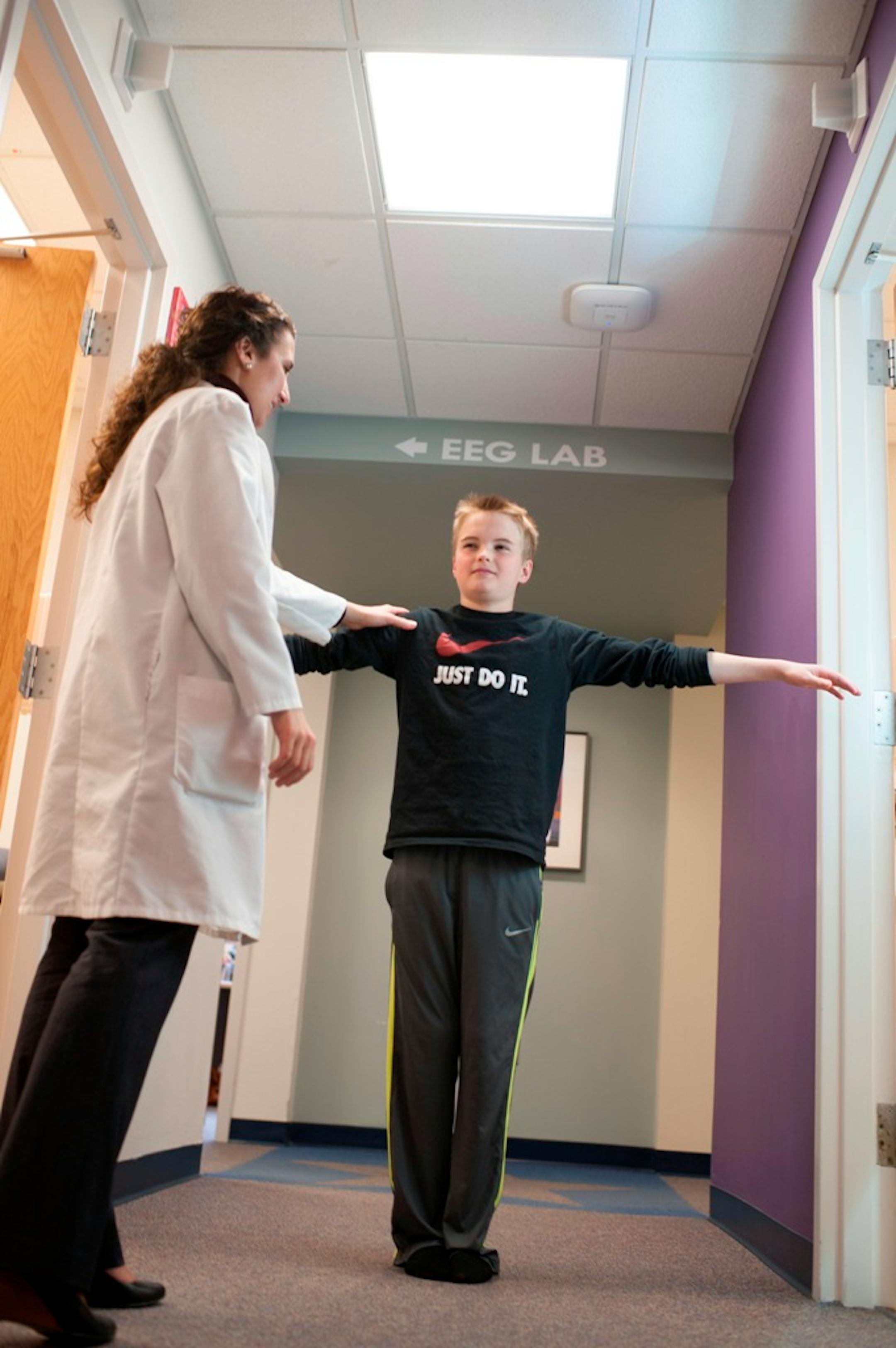 A patient visits the Concussion Clinic at Children's — St Paul on March 11, 2014. (Photo by Scott Streble)